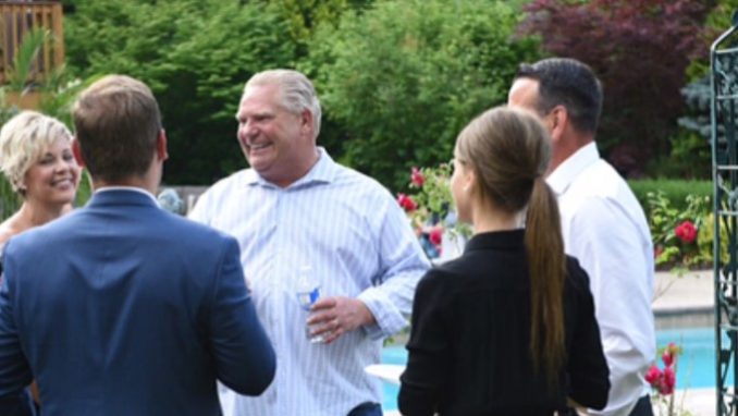 Doug Ford speaks to his team.