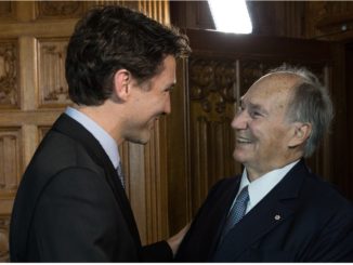 Justin Trudeau greets the Aga Khan in Ottawa in May 2016.