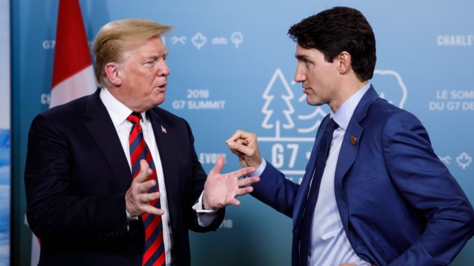 Donald Trump and Justin Trudeau speak at the G7