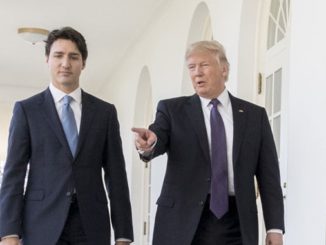 Justin Trudeau walks with Donald Trump at the White House.