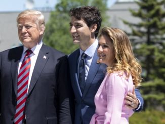 President Donald Trump is met by Justin and Sophie Trudeau at the G7 conference.