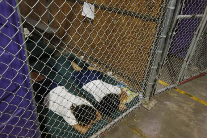 Children sleep in cages at the border. June 18, 2014