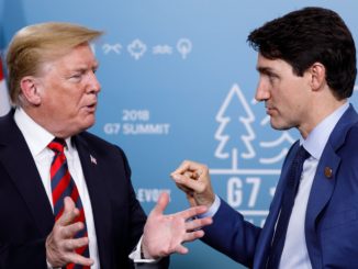 Donald Trump and Justin Trudeau speak together at the G7.